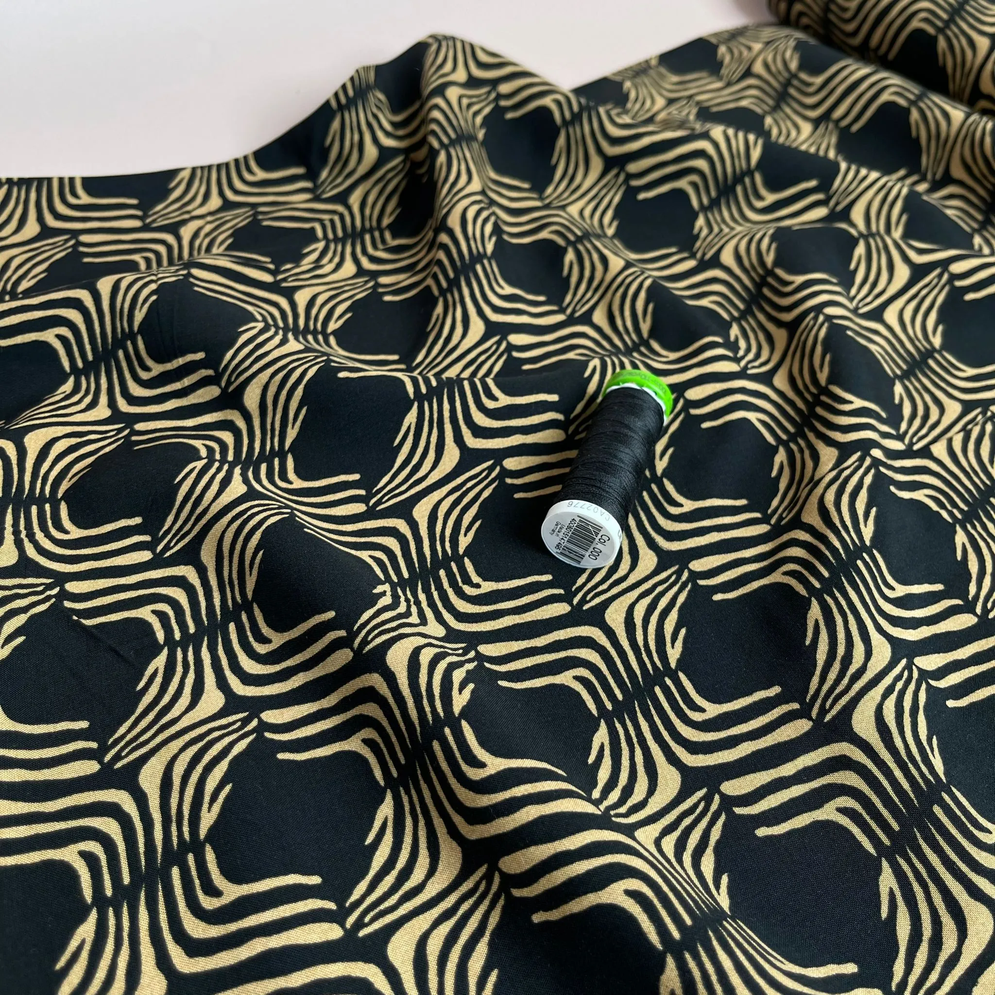 Abstract Lines in Gold on Black Viscose Poplin Fabric