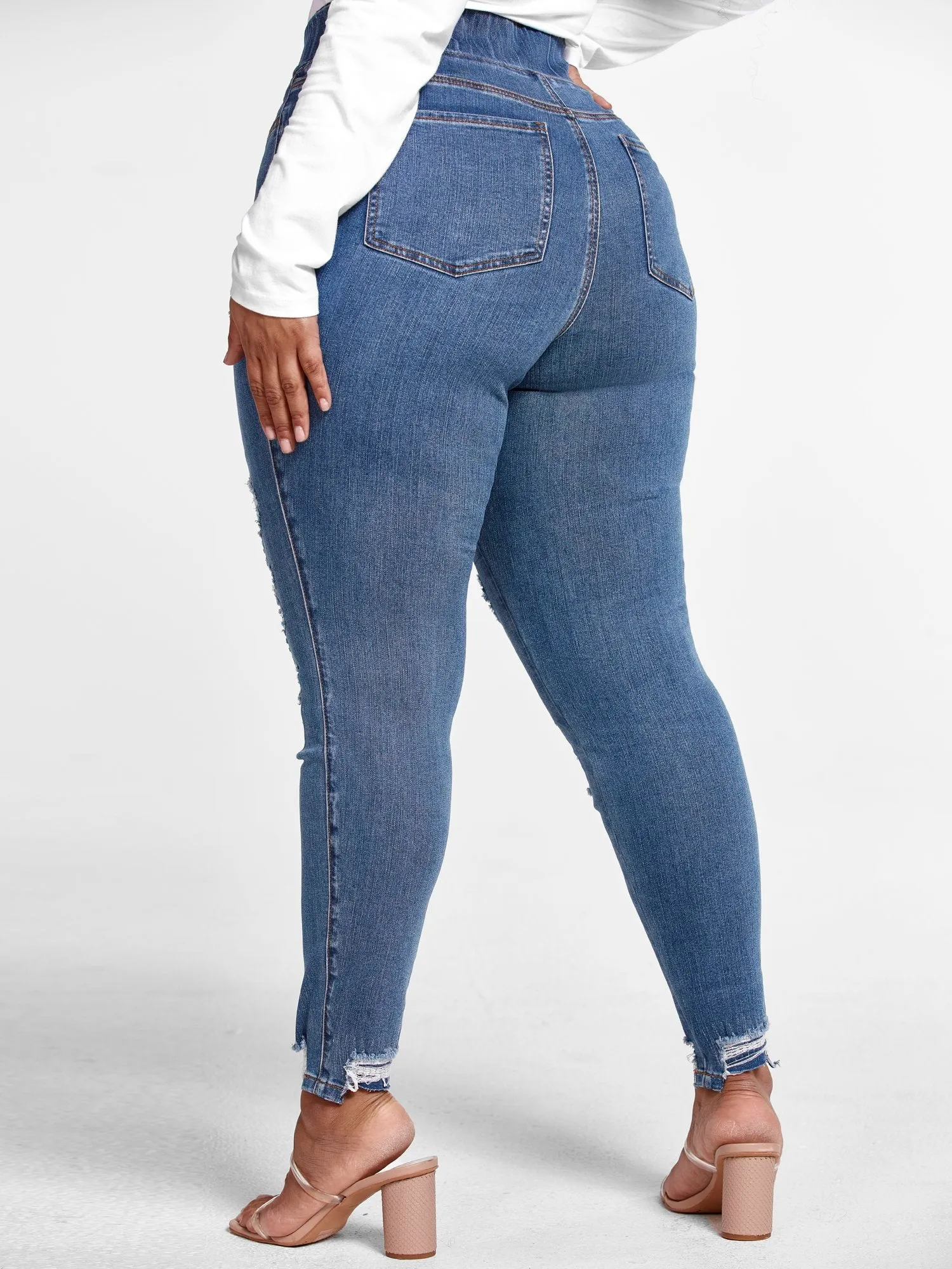 High Rise Medium Wash Destructed Jeggings